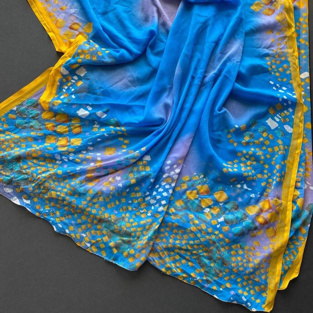 Blue & yellow silk scarf with glitter, gold & white geometric shapes.